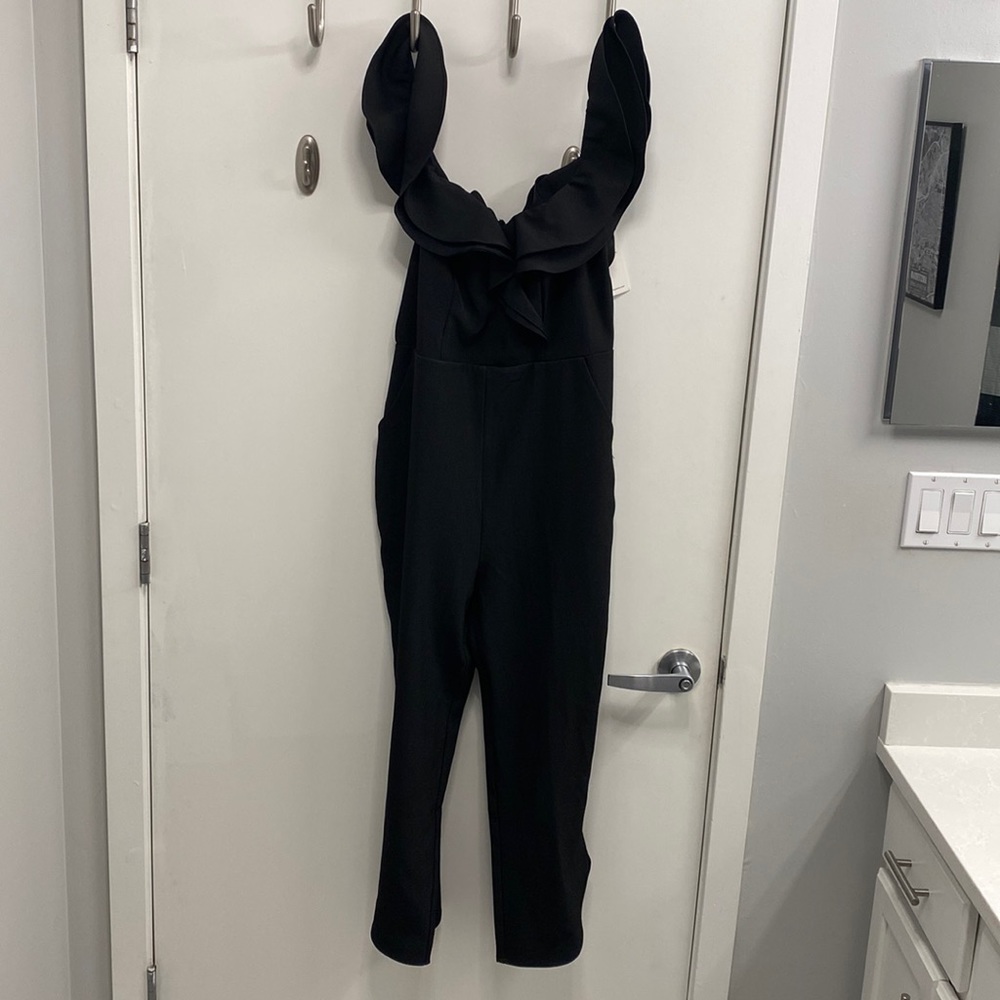 NWT Medium Black Jumpsuit with Ruffle Detailing and Pockets